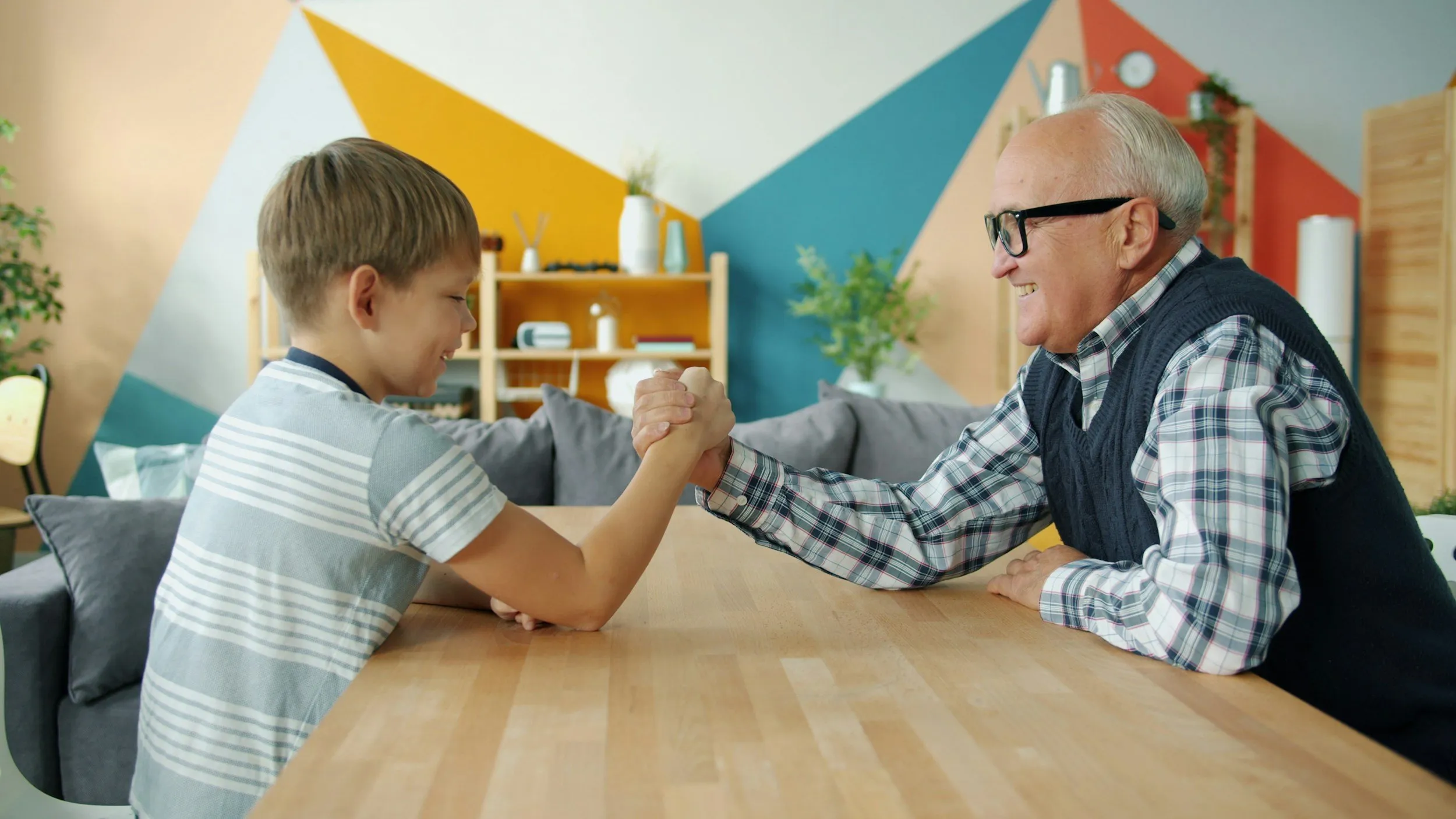 Caregiver spending time with an older adult at home